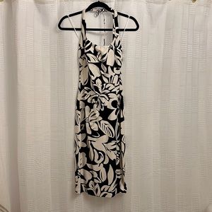 Size 4 summer halter dress. Never worn. Black and white fabric.